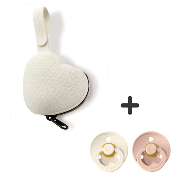 Squooshi Pacifier Holder in white with two BIBS pacifiers in blush and ivory.